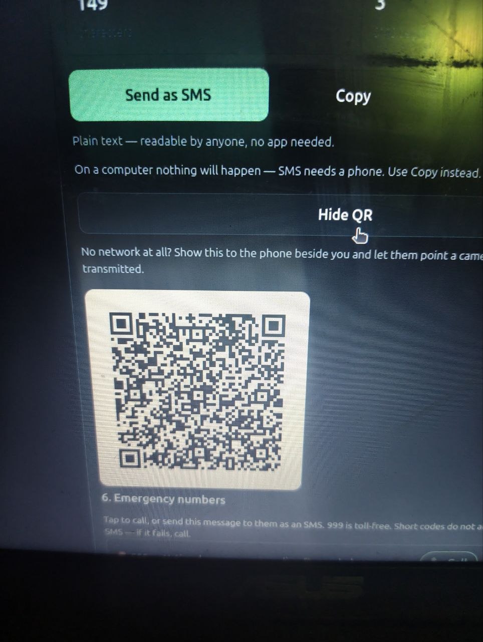 The QR shown on a laptop screen